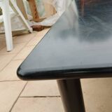 Old vintage wooden coffee table with tubular base