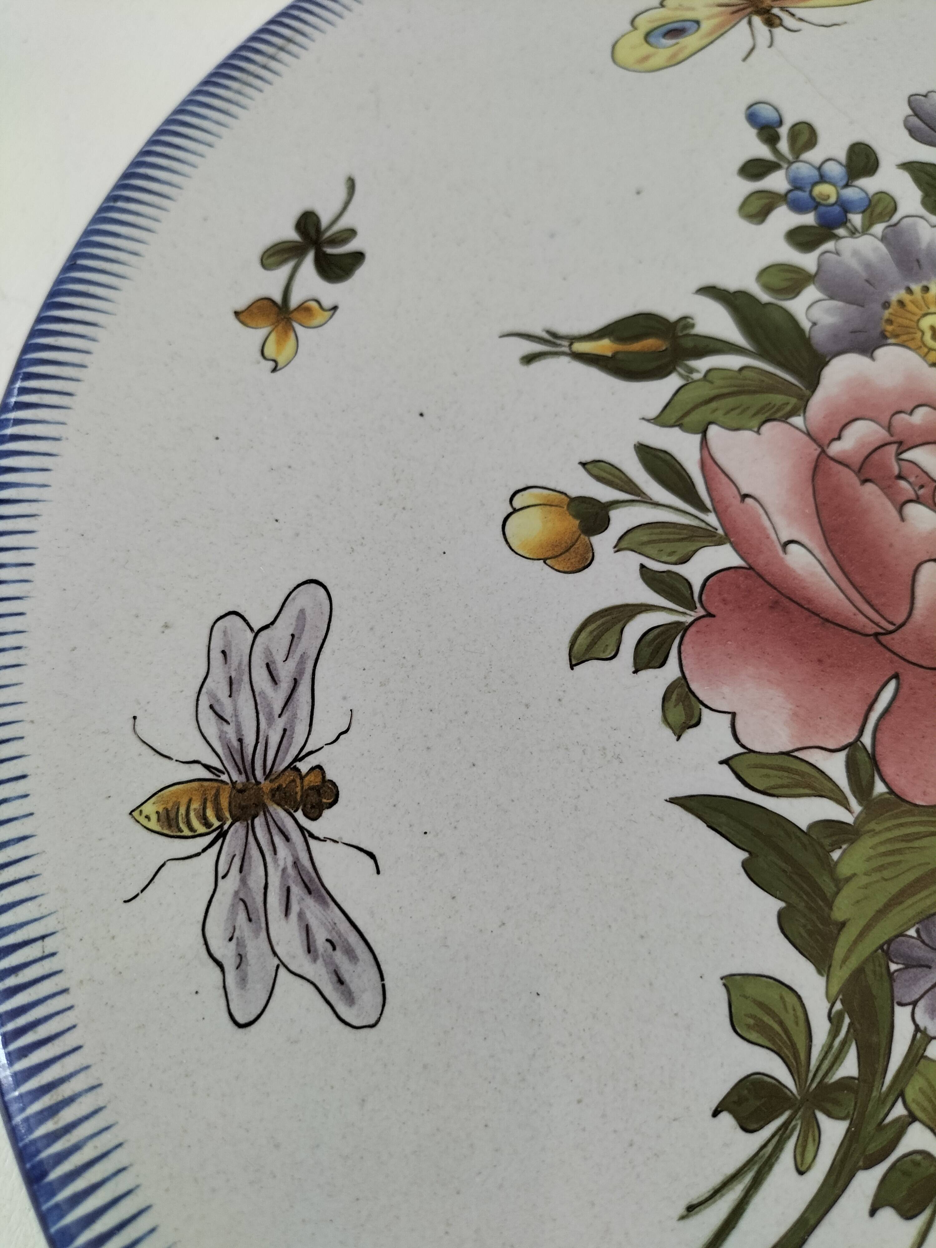 Decorative earthenware plate signed Charolles