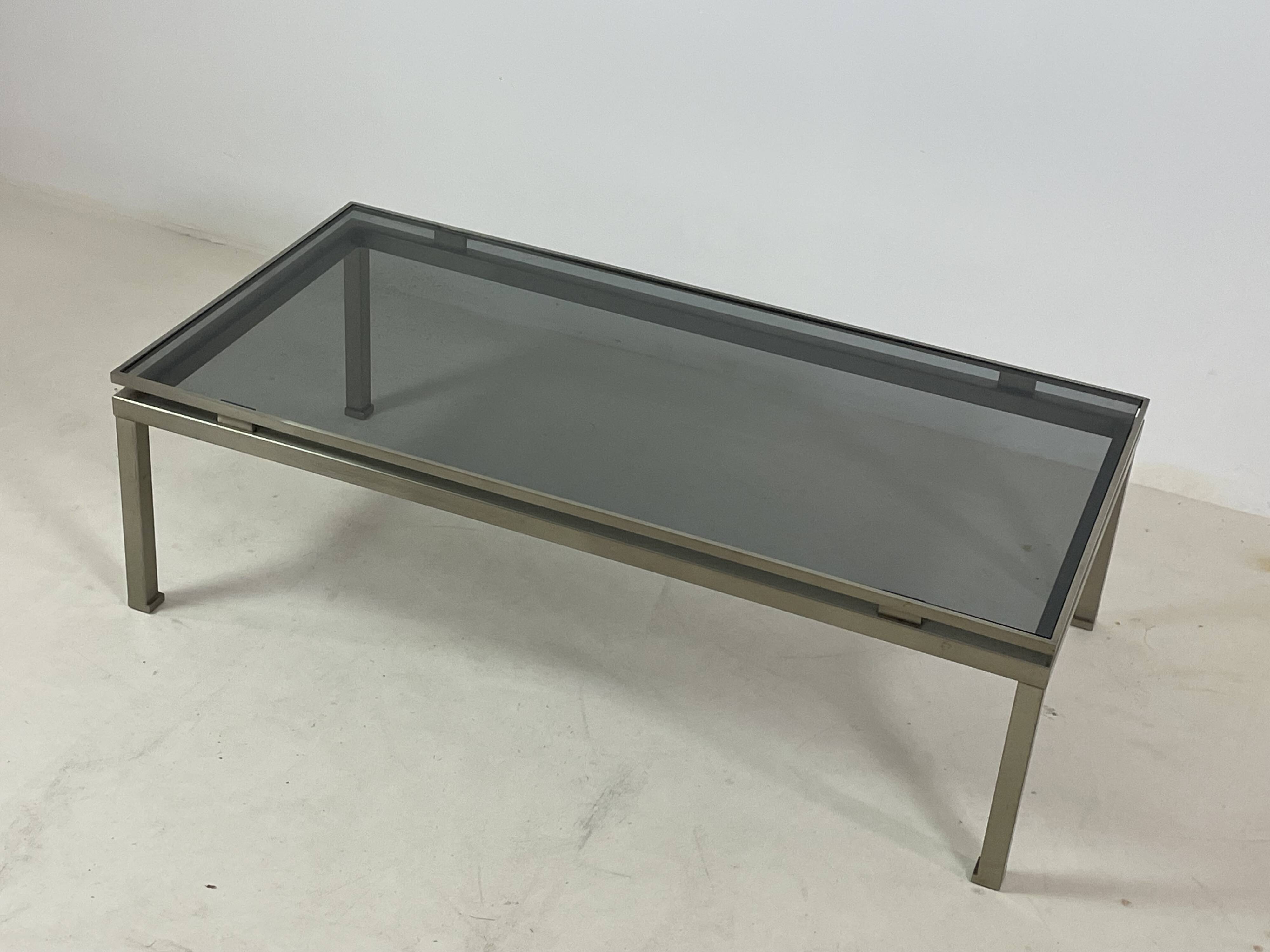 Brass coffee table with smoked glass top by Guy Lefevre, 1970s