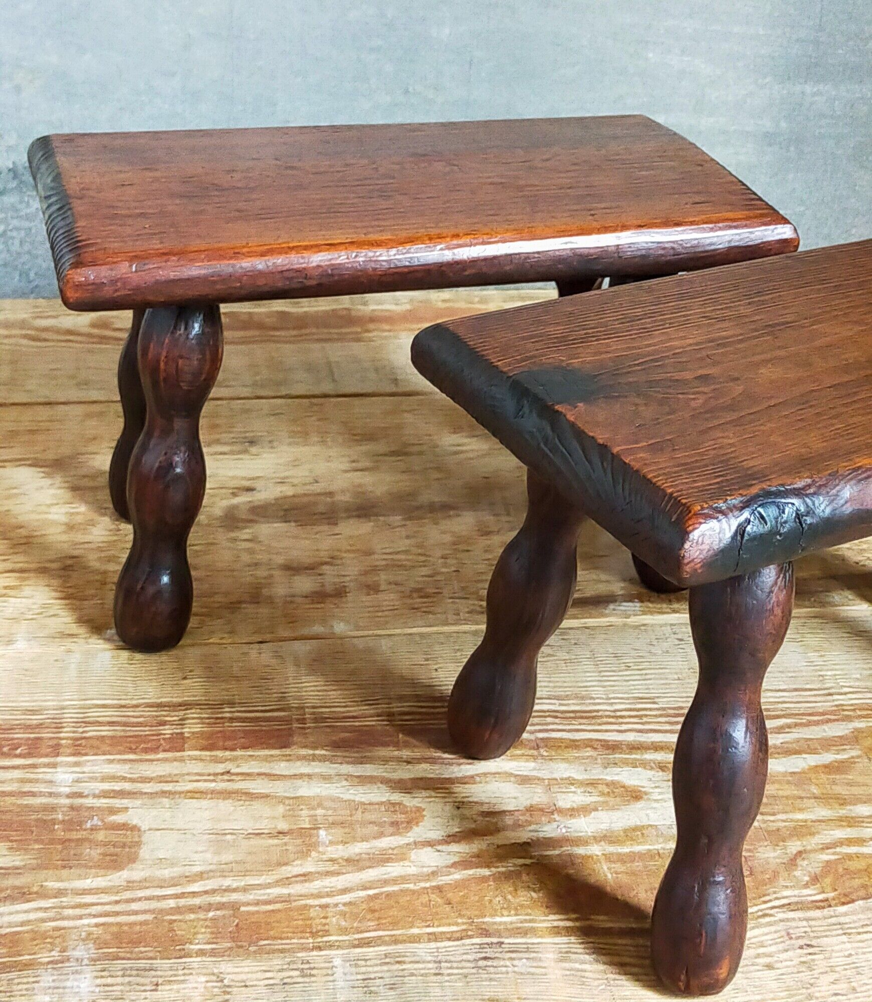 Pair of vintage solid turned wood footstools
