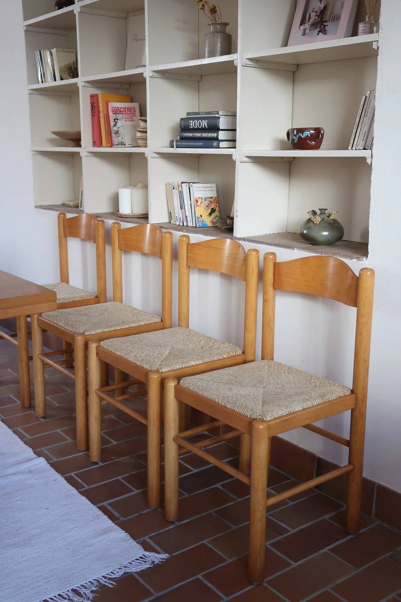 4 solid pine chairs, straw seats, shaped backrest.