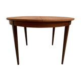 Scandinavian round teak dining table from the 60s extendable