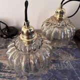 Set of two amber glass pendant lights
