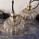 Set of two amber glass pendant lights