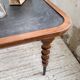 Table drapière en noyer, 1900