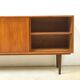 Danish teak sideboard with two sliding doors and 4 central drawers