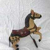 Wooden horse with period ironwork support