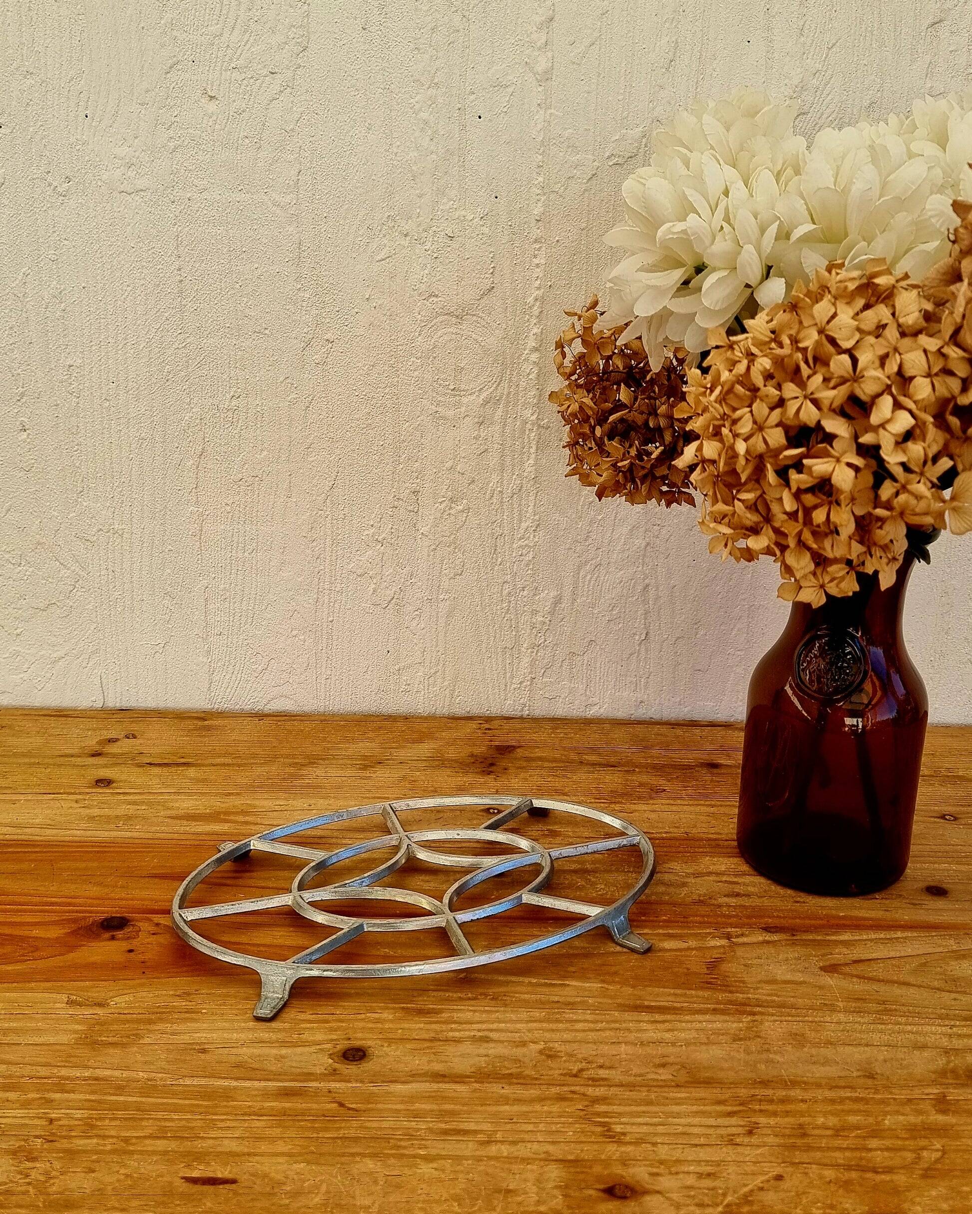 Vintage aluminium trivet