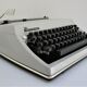 Writers' typewriters of light grey 70s Adler made in Holland