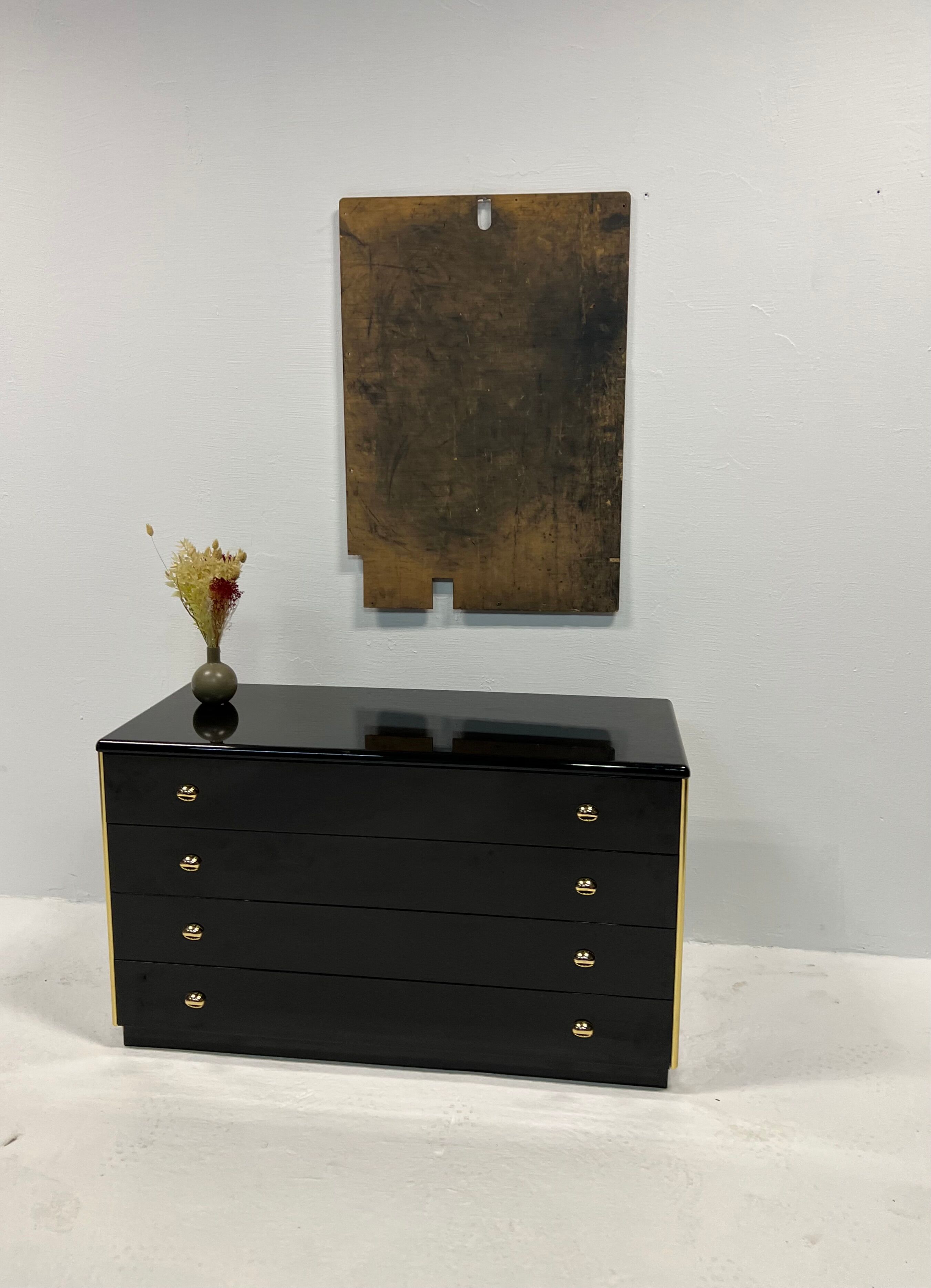 Black lacquered chest of drawers