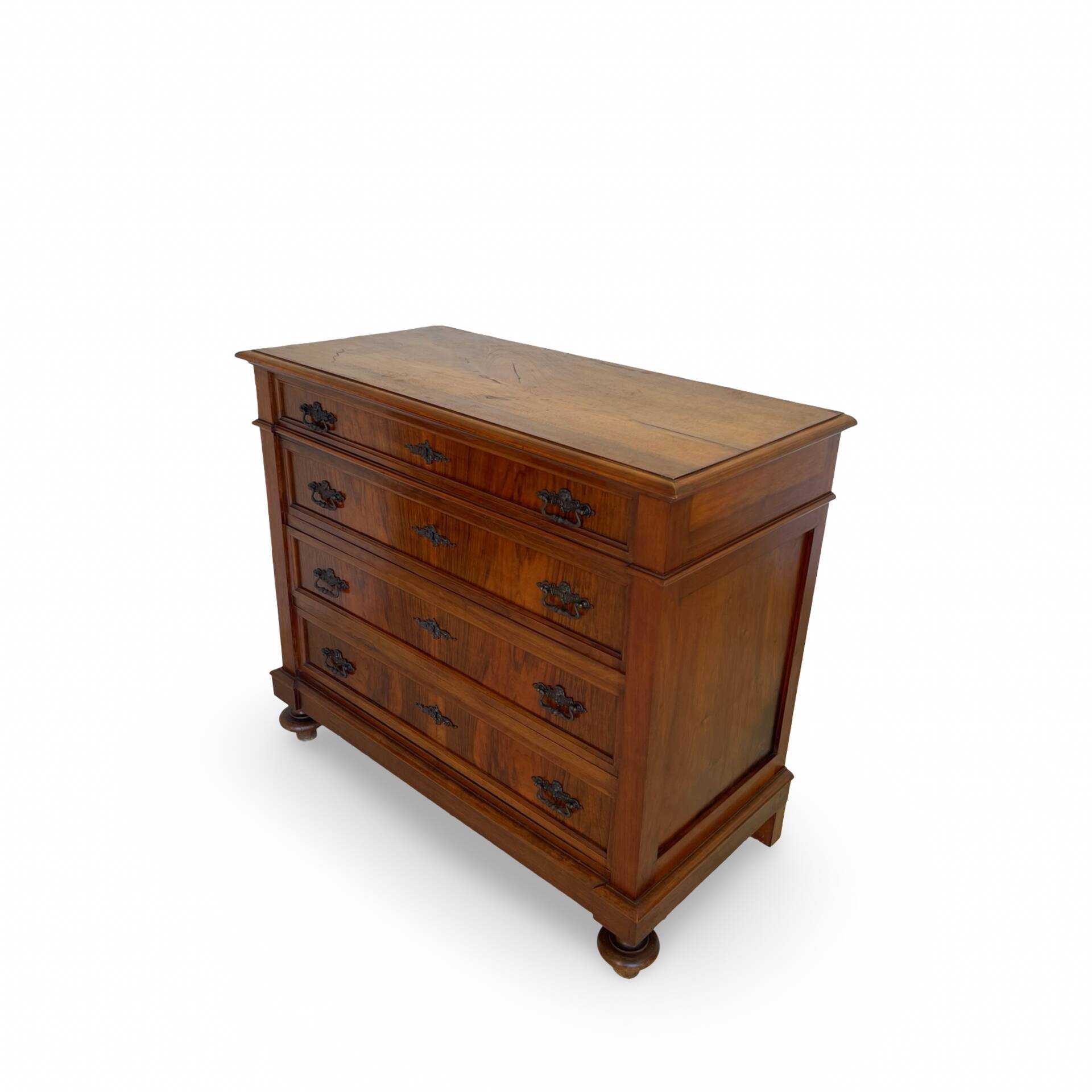 Antique walnut commode with bronze handles in the shape of a lion's mask,