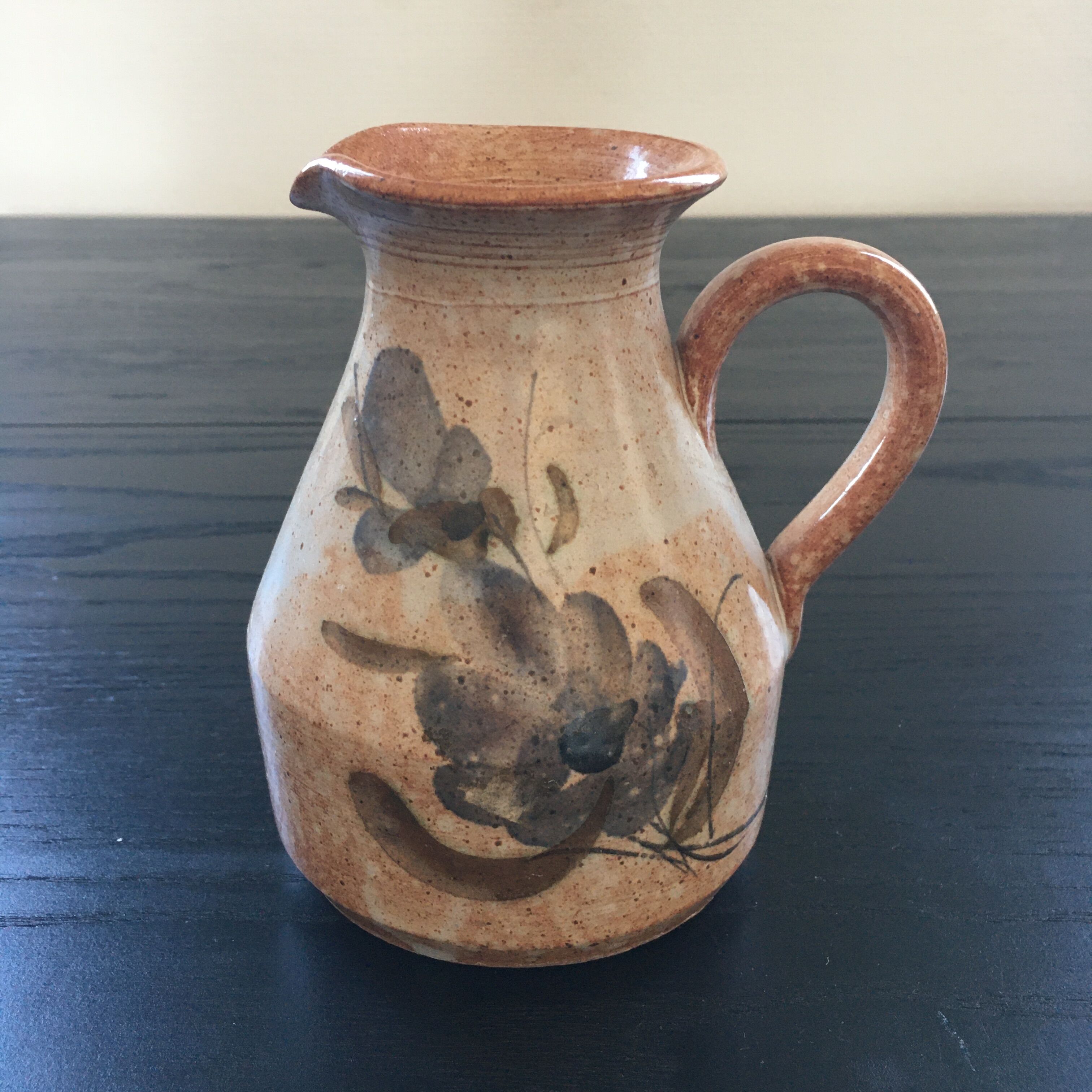 Pitcher beige floral decoration