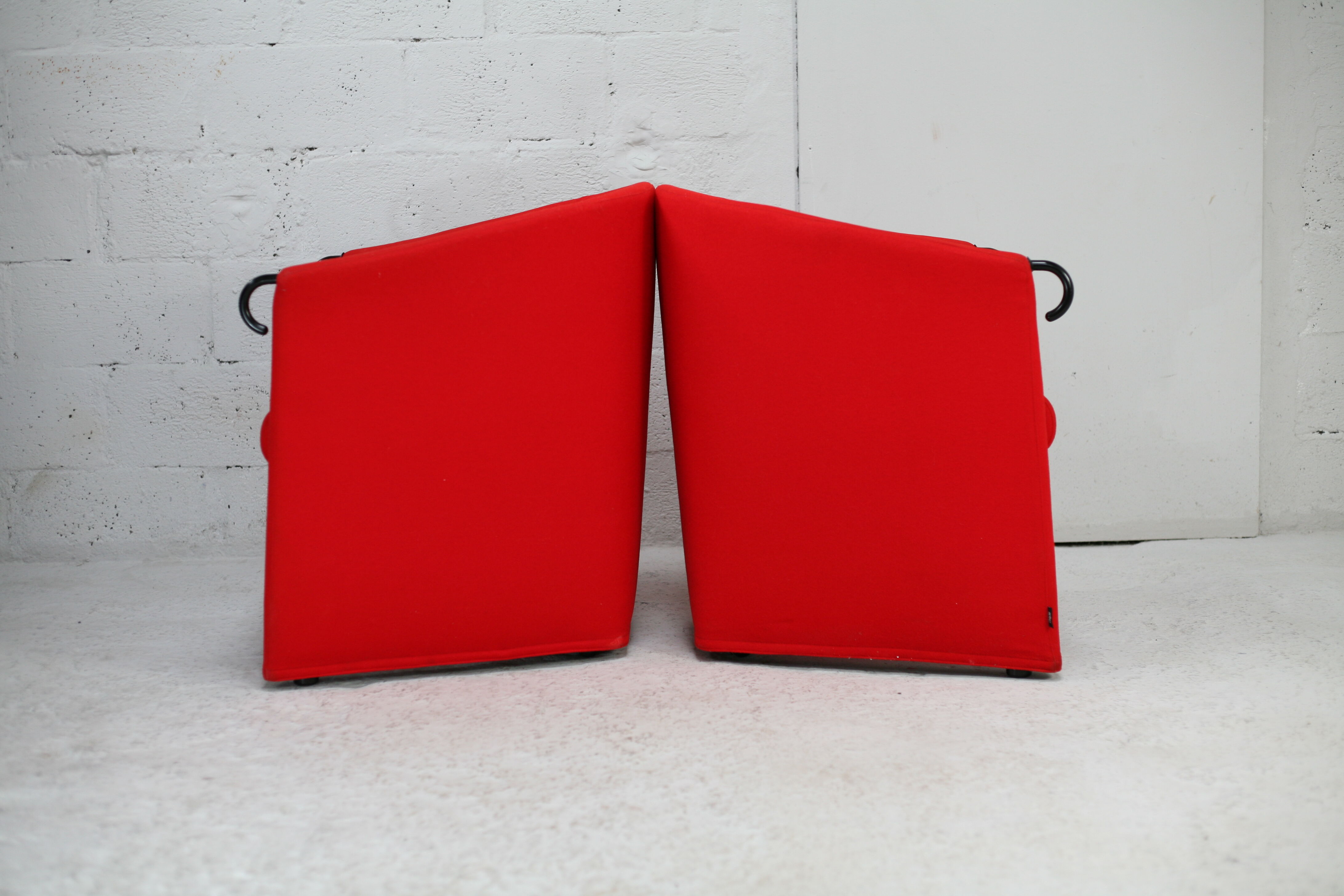 Pair of red Arflex armchairs. Italy, circa 1980