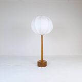 Mid-century solid teak table lamp from the 1960s Sweden.