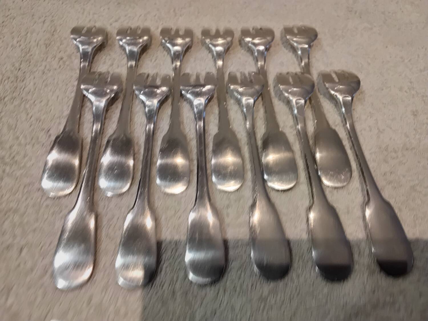 12 silver-plated oyster forks by Christofle Cluny, 14.9cm