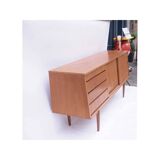 Vintage Scandinavian enfilade with a slanted façade.