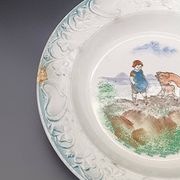 Large antique hollow dish from the 19th century, earthenware with pastoral decoration featuring a child, pig, and goose.