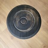 Black wooden tripod stool