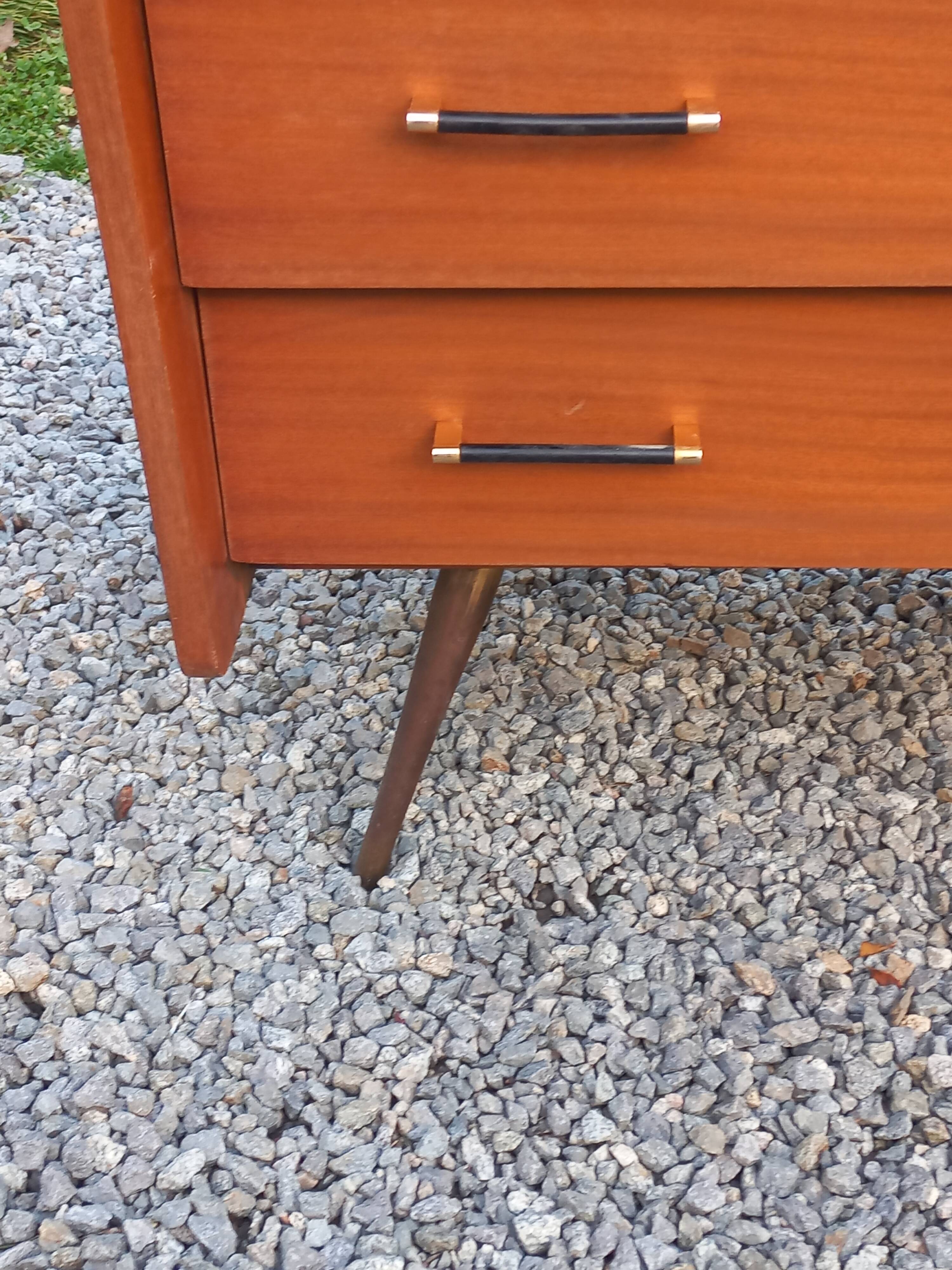 Vintage mahogany commode with metal tapered legs, 4 drawers, 1950s.