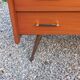 Vintage mahogany commode with metal tapered legs, 4 drawers, 1950s.