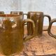 Set of 5 brown stoneware mugs