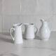 3 old French pitchers in white ceramic