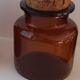 Old amber glass jar