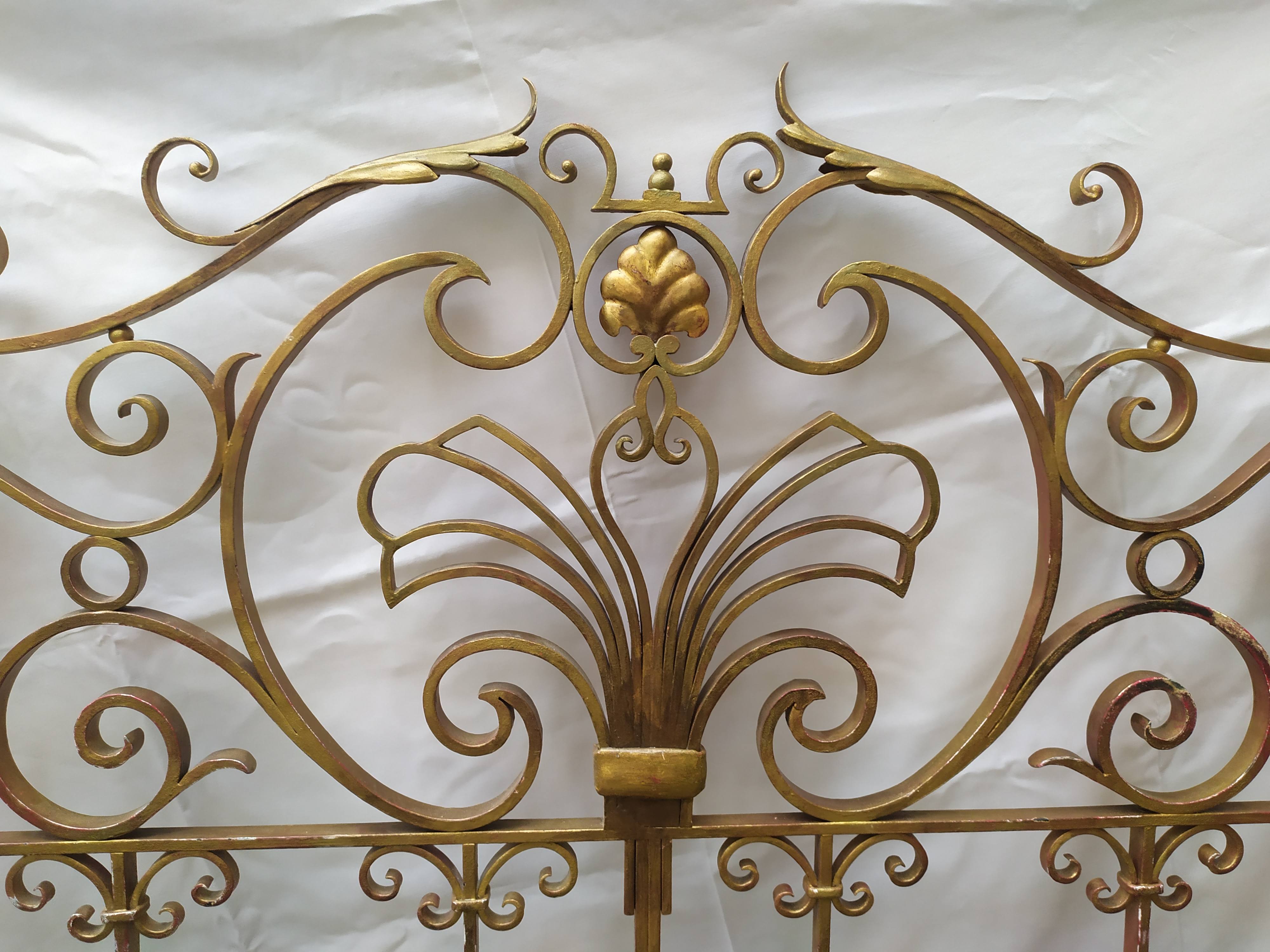 Golden wrought iron bedhead
