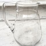 Chiseled glass pitcher