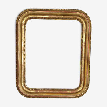 Old frame with doucine gilded stucco wood