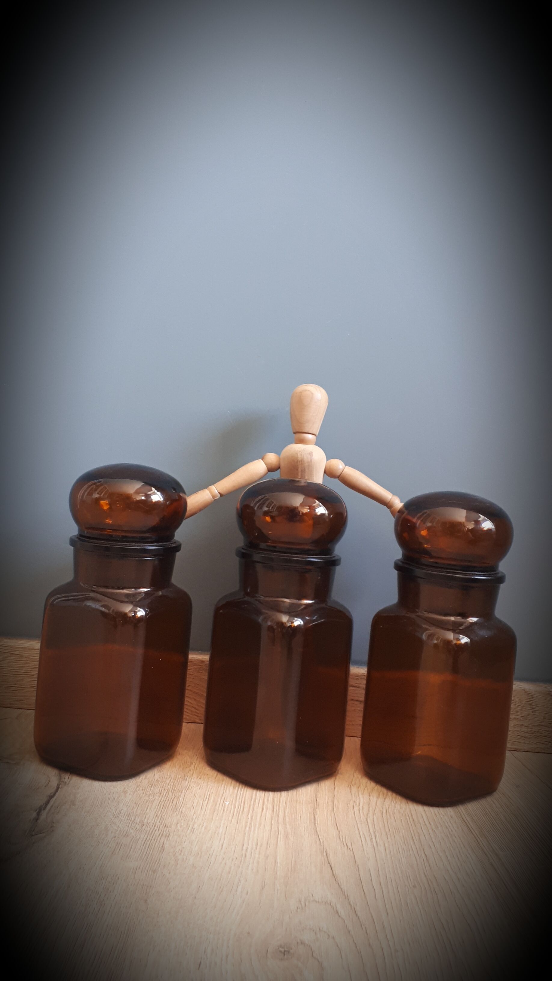 Trio round brown apothecary bottles