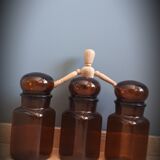 Trio round brown apothecary bottles