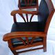 Paire de fauteuils style colonial bois et cuir de chèvre