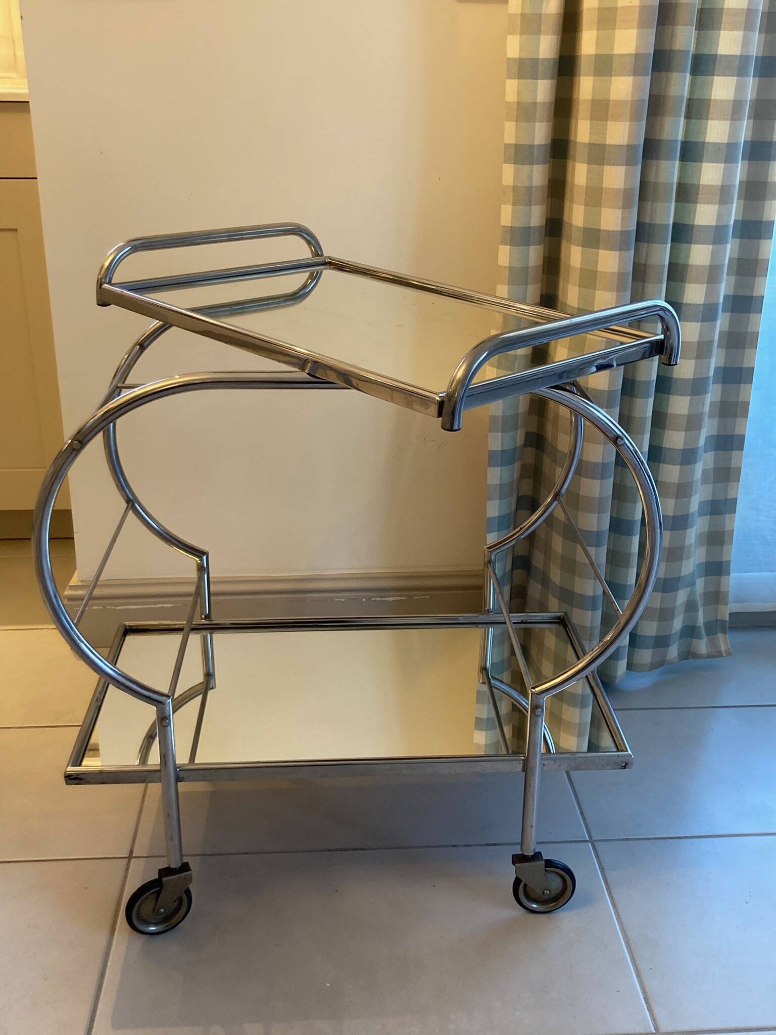 Chromed metal and mirror serving trolley
