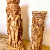 Two ancient Indonesian candlesticks.