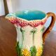 Antique floral barbotine jug – late 19th century ceramic