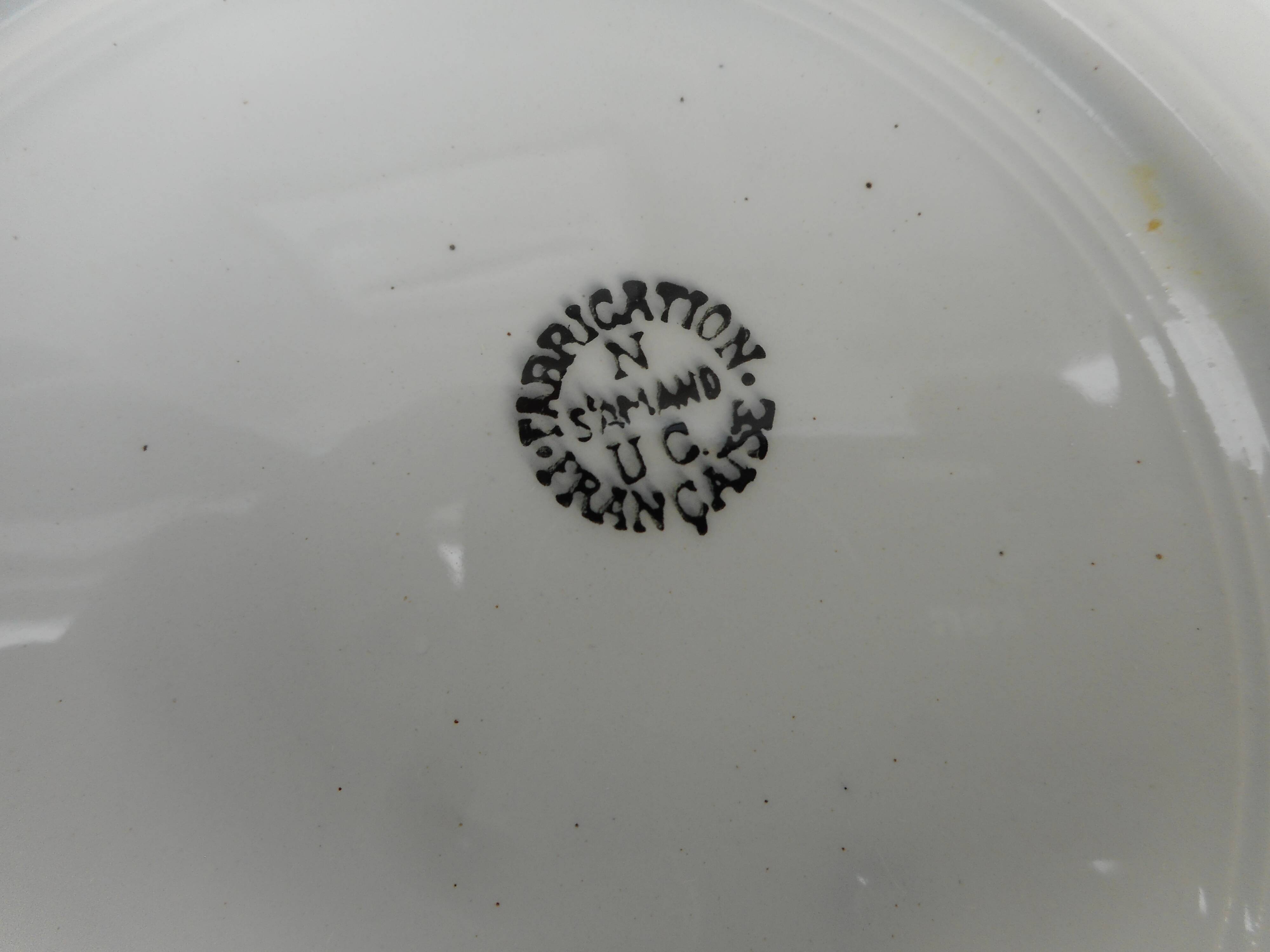 Six hollow plates made of earthenware