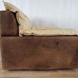 Fauteuil avec pouf en cuir et daim
