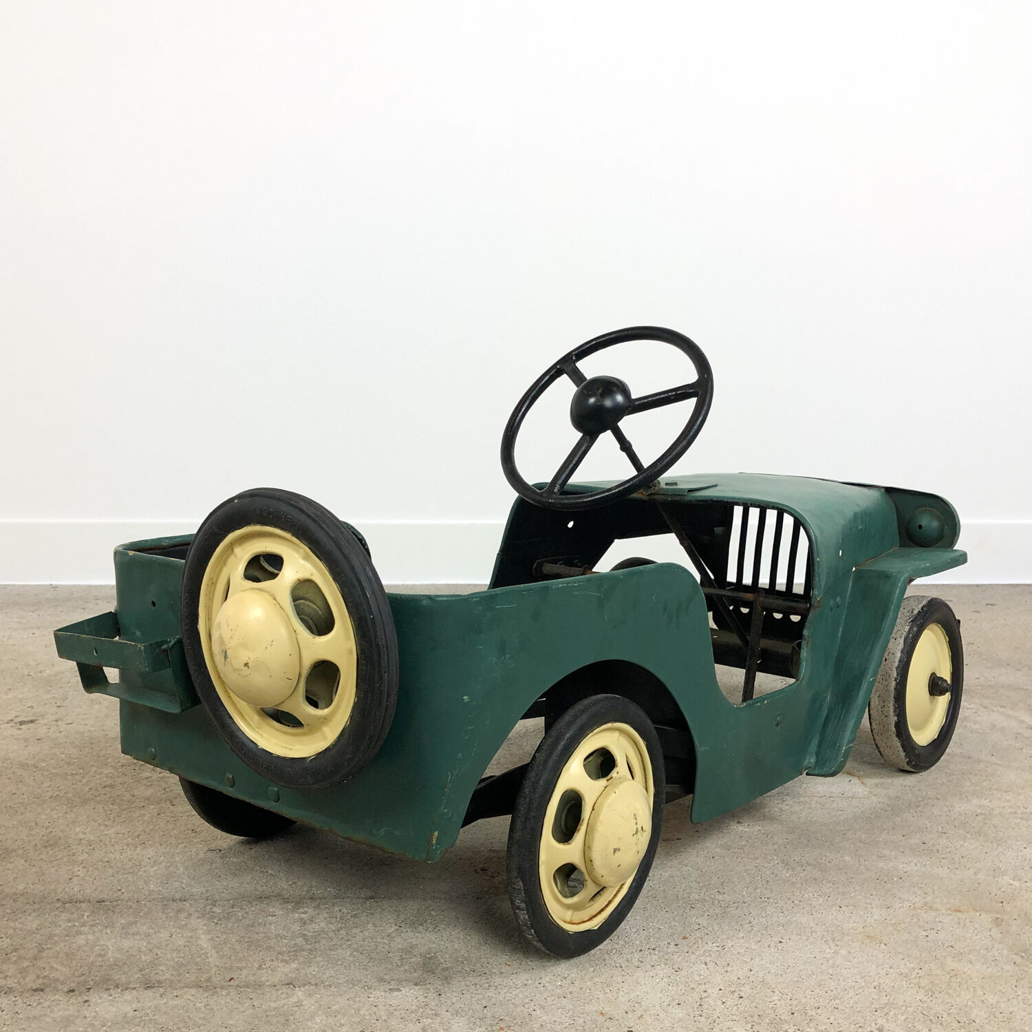 Vintage Willys Jeep pedal car by Tri-Ang