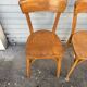 (Lot) 5 honey-coloured bistro chairs