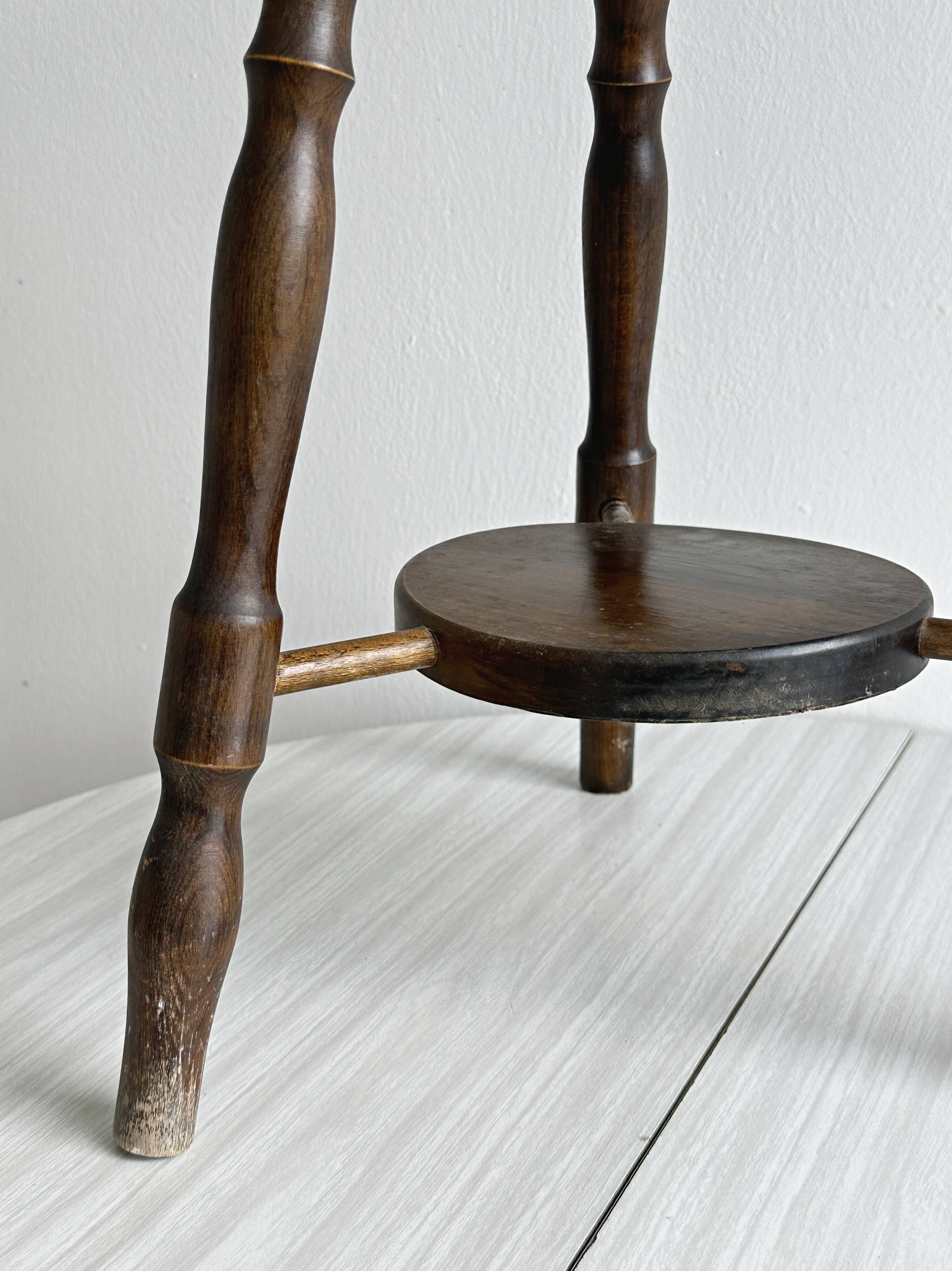 Antique dark wood stool