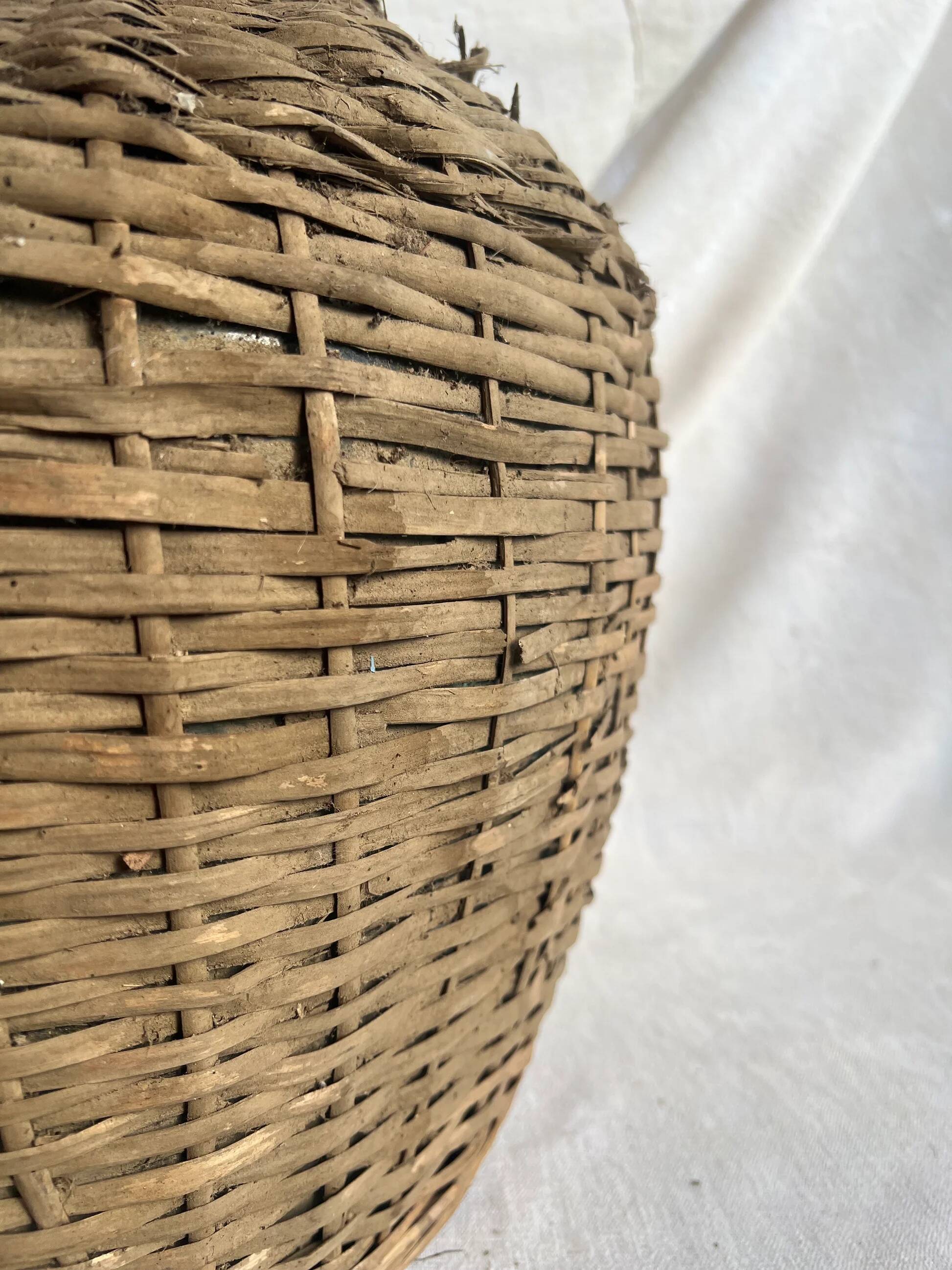 Vintage Spanish wicker demijohn bottle
