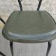 Pair of black metal chairs and khaki green skai, 60s