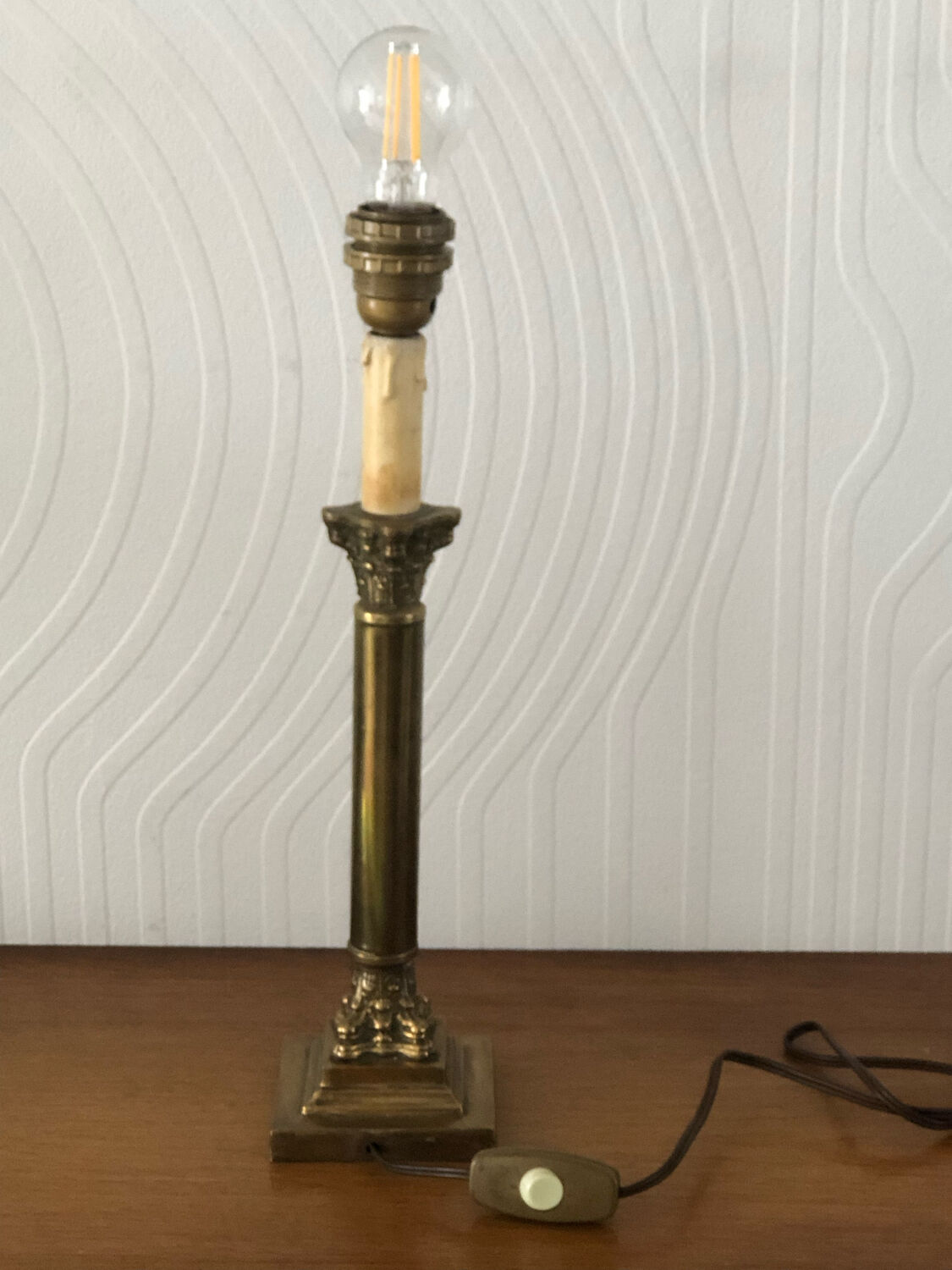 Ancient lamp foot candlestick corinthian column in bronze