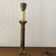 Ancient lamp foot candlestick corinthian column in bronze