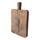 Very large old olive wood cutting board.