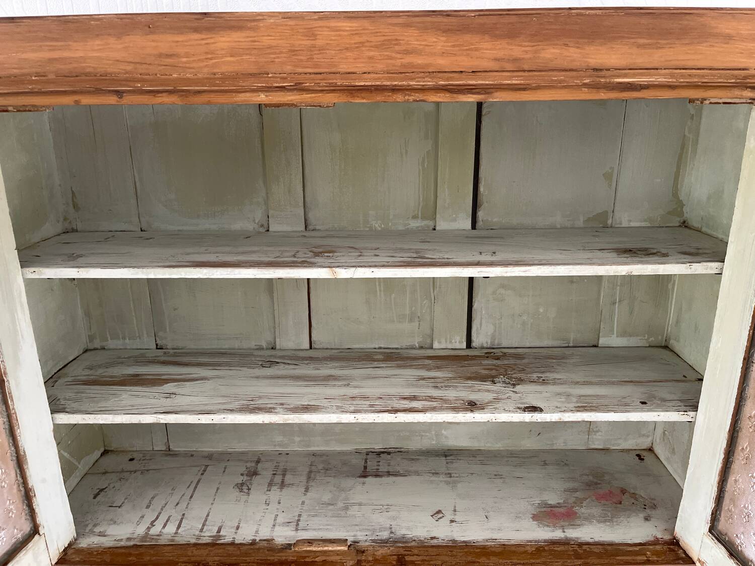 Antique dresser with glass doors and fleur-de-lys from the 50s