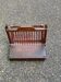 Vintage magazine rack, foldable wooden document holder.