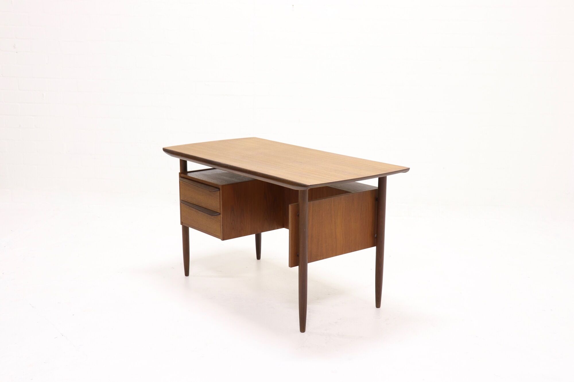 Mid century teak 'Cow Horn' Writing Desk by Tijsseling for Hulmefa 1960s