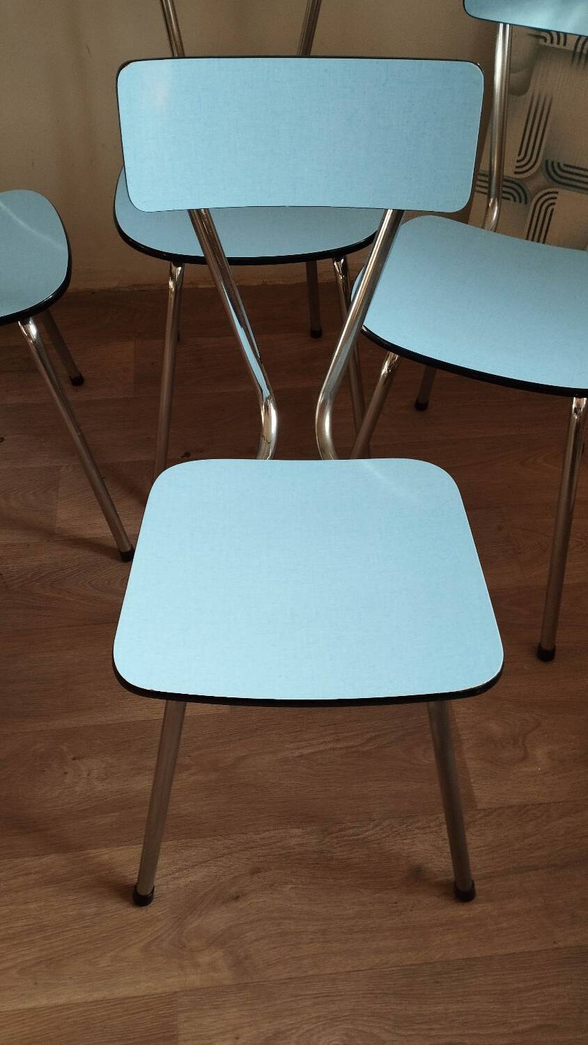4 blue Formica chairs
